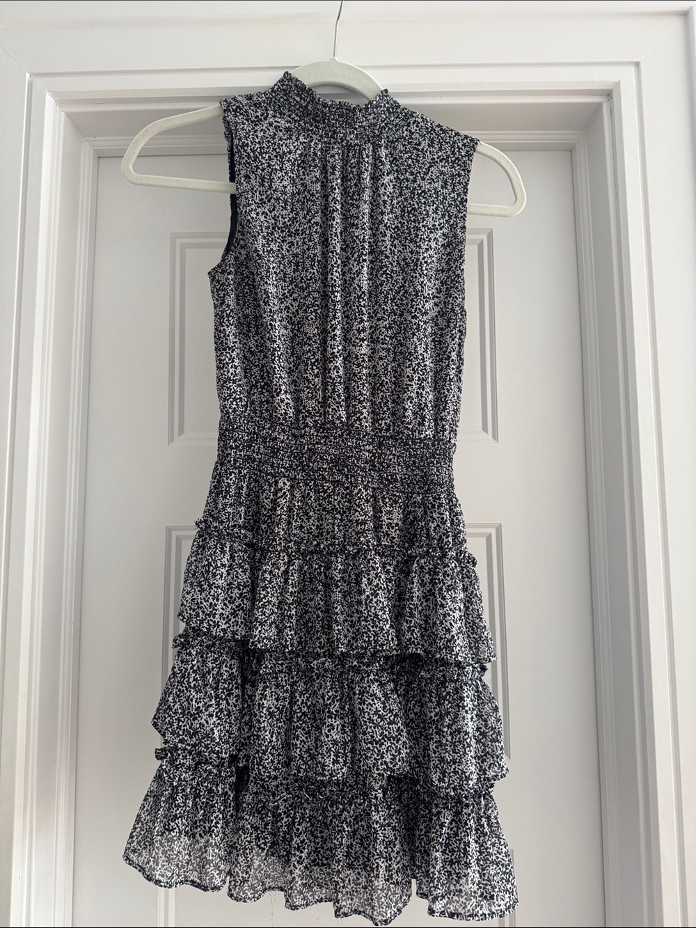 Sleeveless Black & White Smocked Tiered Mini Dress